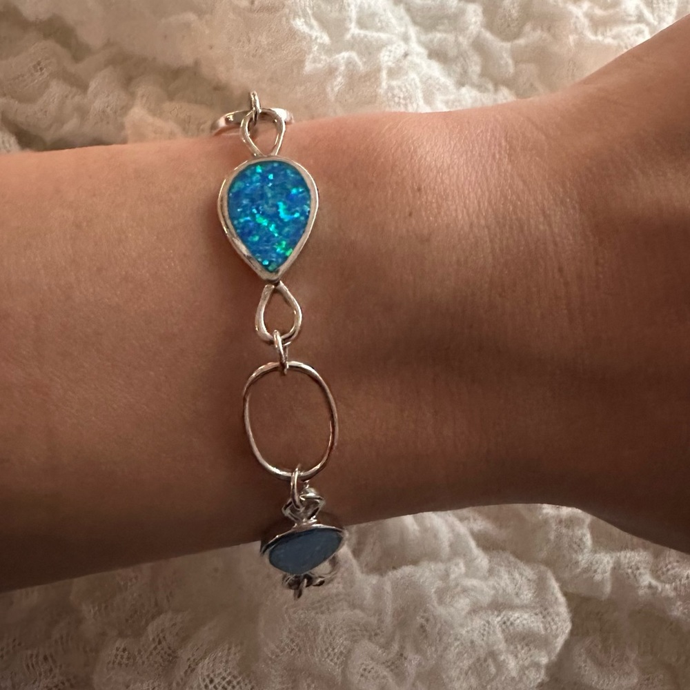 Beautiful sterling silver bracelet with blue/teal detailing